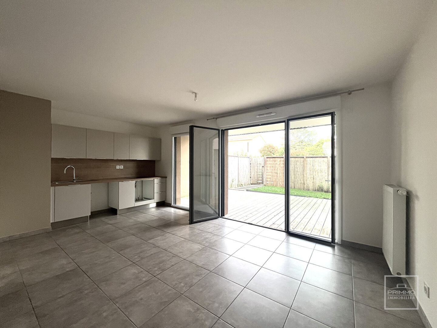 A Dardilly appartement en rez de chaussée 3 pièce(s) 65.24 m2 avec terrasse et jardin de 39.69m², garage et place de parking
